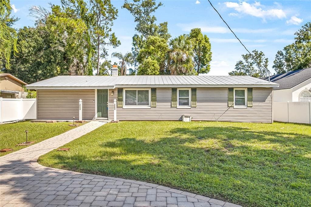 8707 FOUNTAIN AVENUE TAMPA, FL 33615