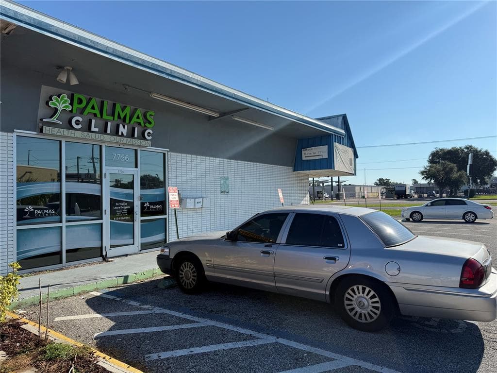 7756 PALM RIVER ROAD TAMPA, FL 33619