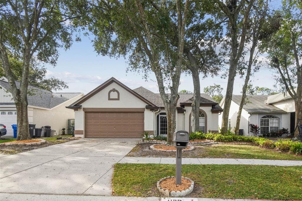 1129 BLOOM HILL AVENUE VALRICO, FL 33596