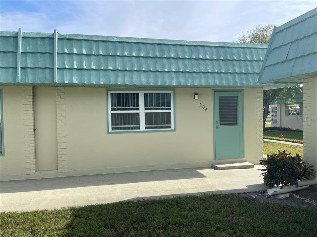 101 CAMBRIDGE TRAIL UNIT 206 SUN CITY CENTER, FL 33573