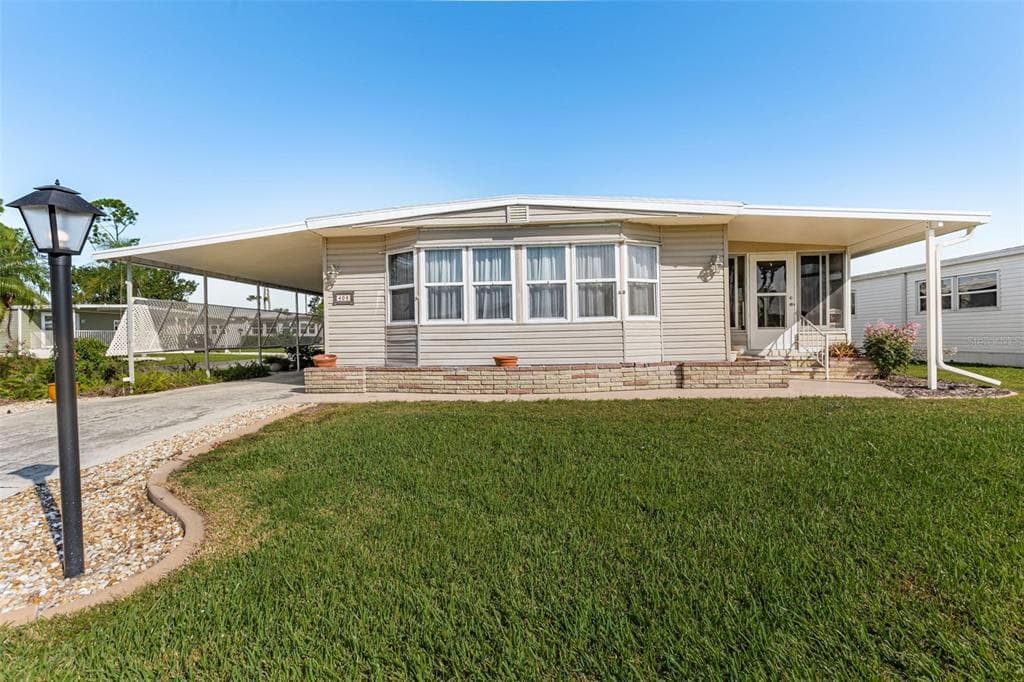 406 CHIQUITA NORTH PORT, FL 34287