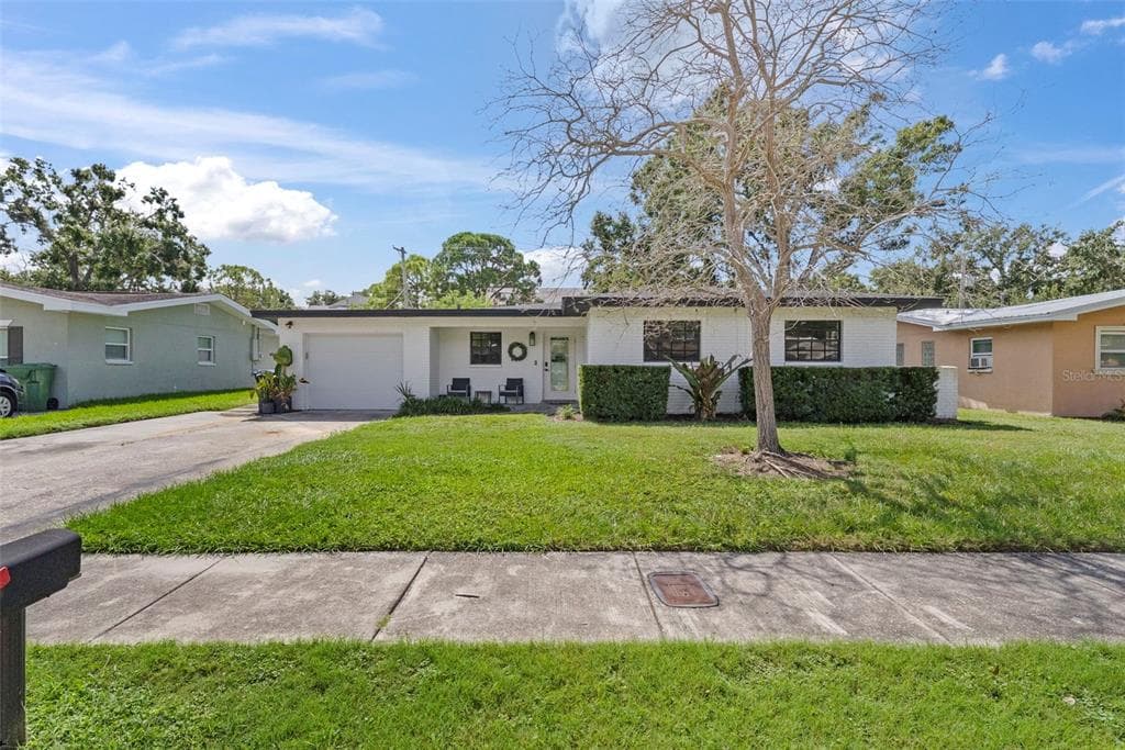 4714 W OAKELLAR AVENUE TAMPA, FL 33611