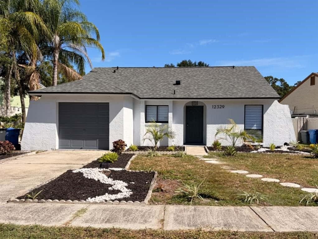 12329 WITHERIDGE DRIVE TAMPA, FL 33624