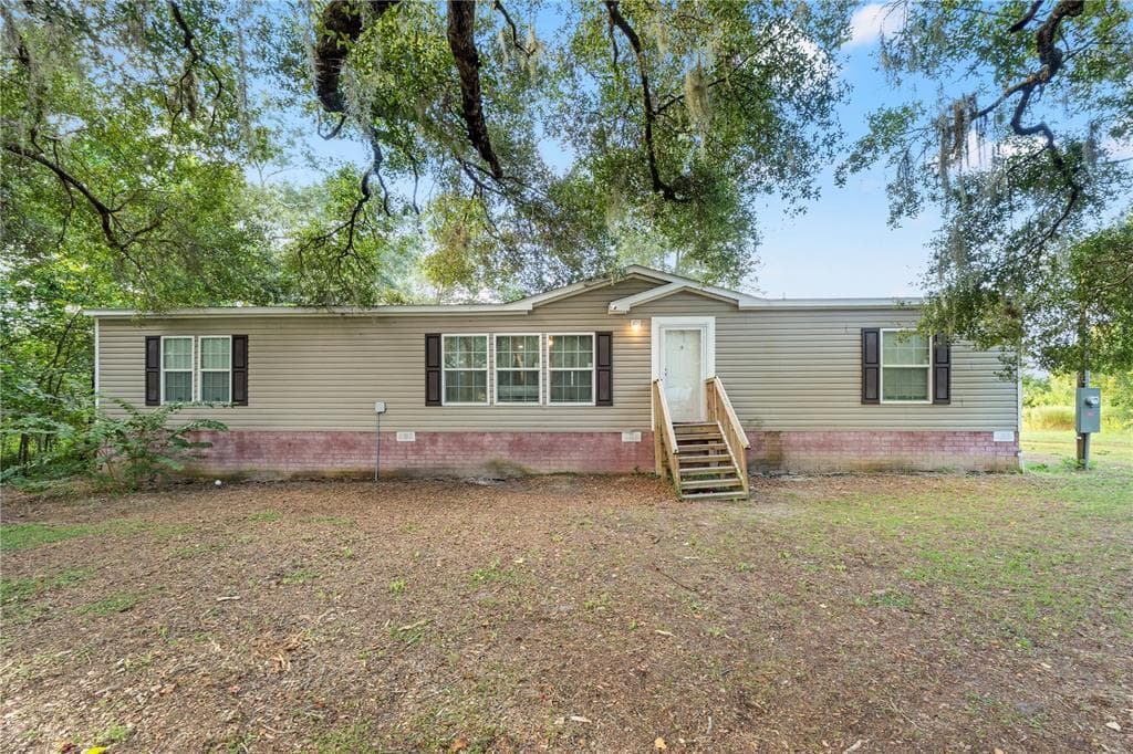 9228 NE 7TH PATH WILDWOOD, FL 34785
