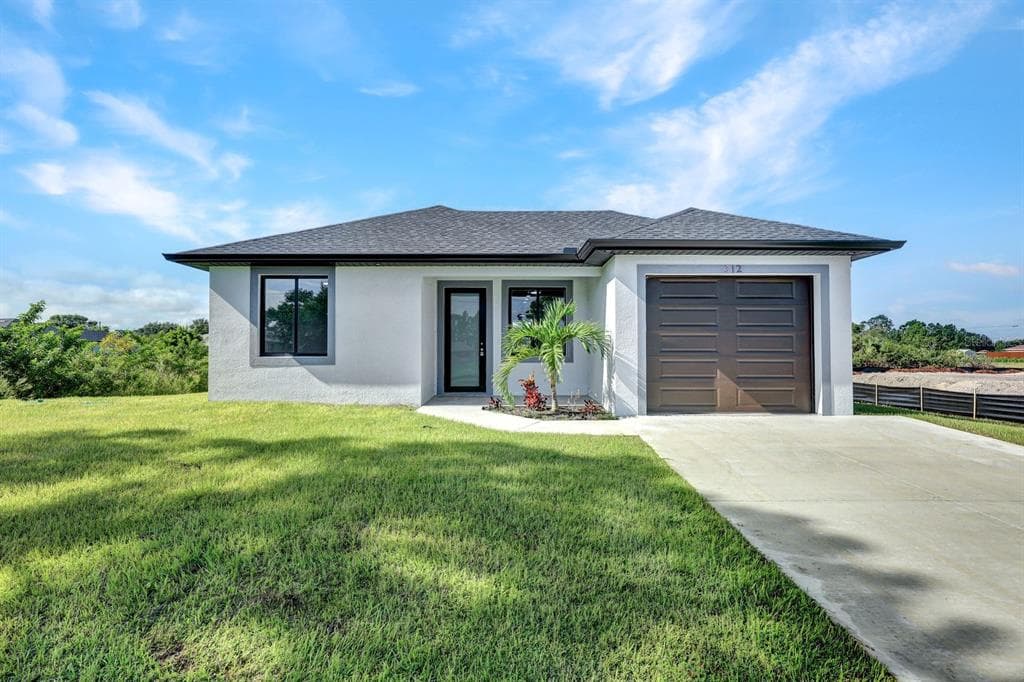 312 PROGRESS AVENUE LEHIGH ACRES, FL 33974