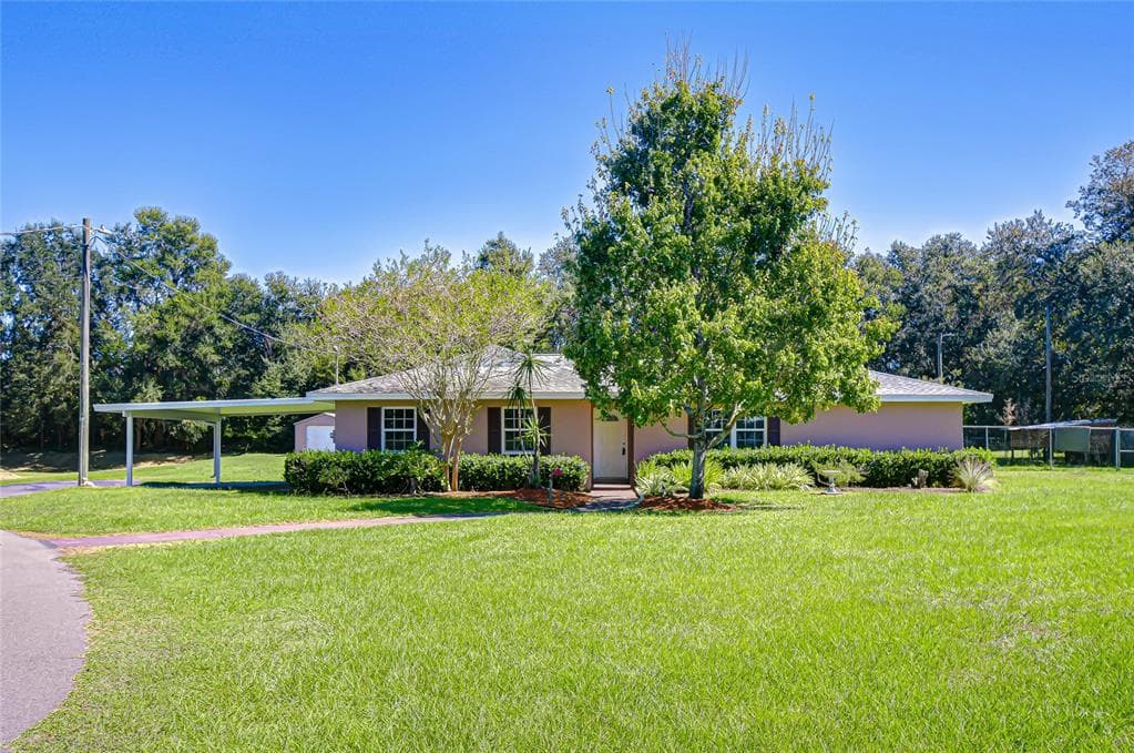 12442 GREEN OAK LANE DADE CITY, FL 33525