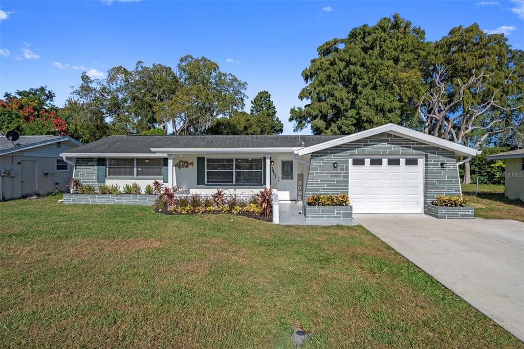 7801 RAINTREE DRIVE NEW PORT RICHEY, FL 34653