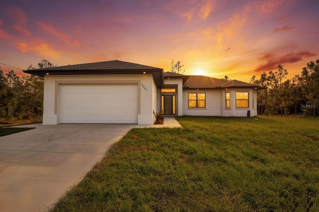 2002 E 10TH STREET LEHIGH ACRES, FL 33936
