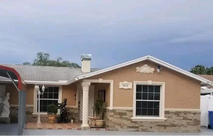 9607 KINGSBURGH COURT TAMPA, FL 33615