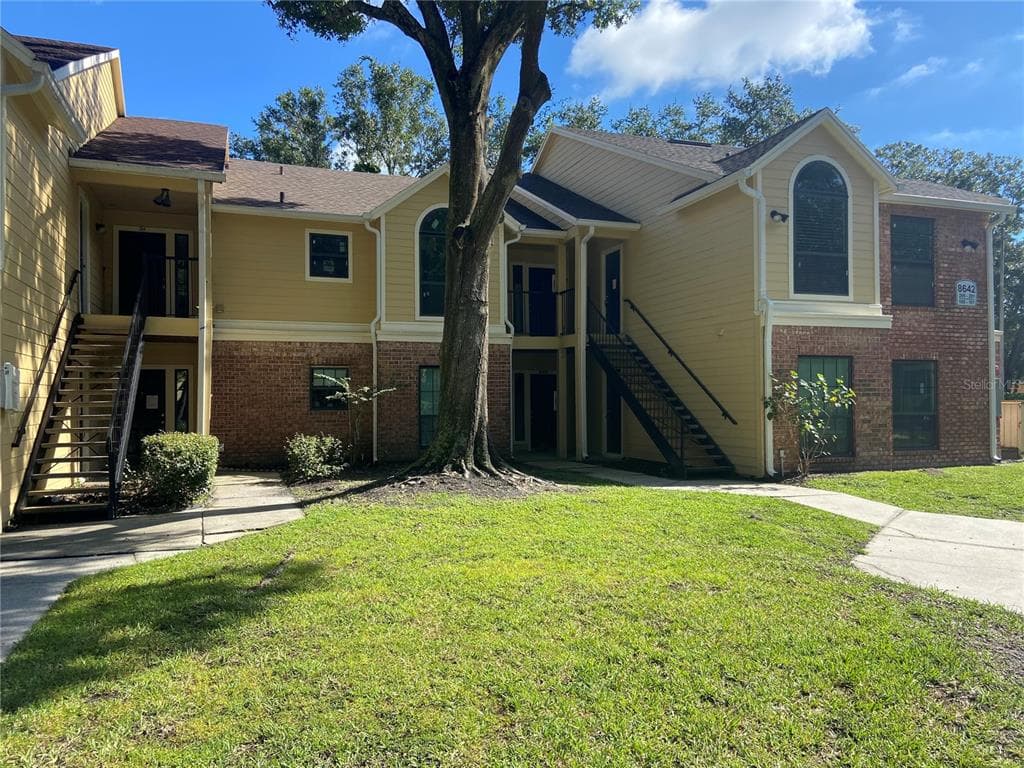 8642 MALLARD RESERVE DRIVE UNIT 201 TAMPA, FL 33614
