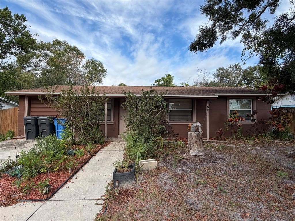 6513 RUNNINGWOODS DRIVE TAMPA, FL 33634