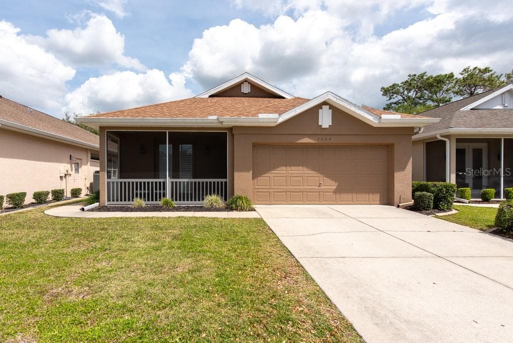 5664 LEGEND HILLS LANE SPRING HILL, FL 34609
