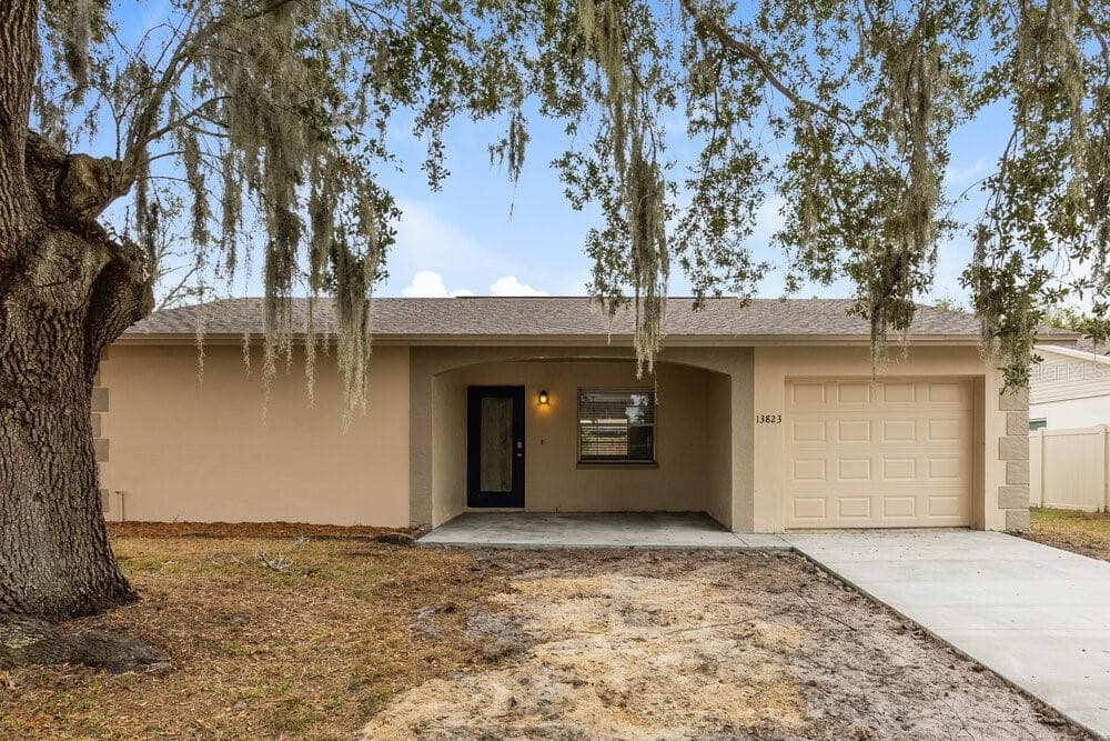 13823 PATHFINDER DRIVE TAMPA, FL 33625
