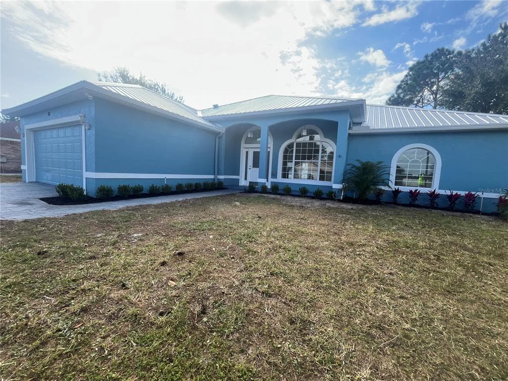 10 LEWIS SHIRE PLACE PALM COAST, FL 32137
