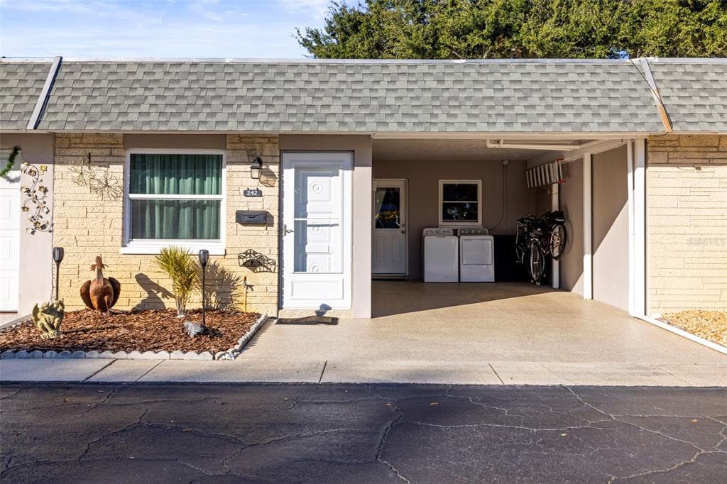 242 SKY LOCH DRIVE E DUNEDIN, FL 34698