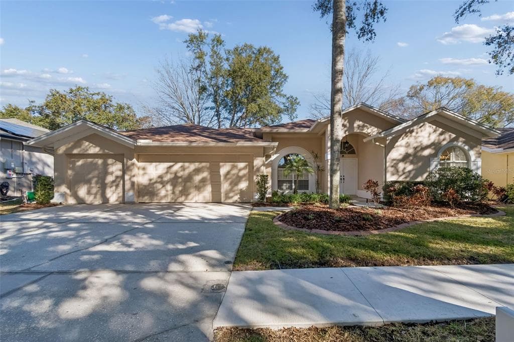 9334 HAMPSHIRE PARK DRIVE TAMPA, FL 33647