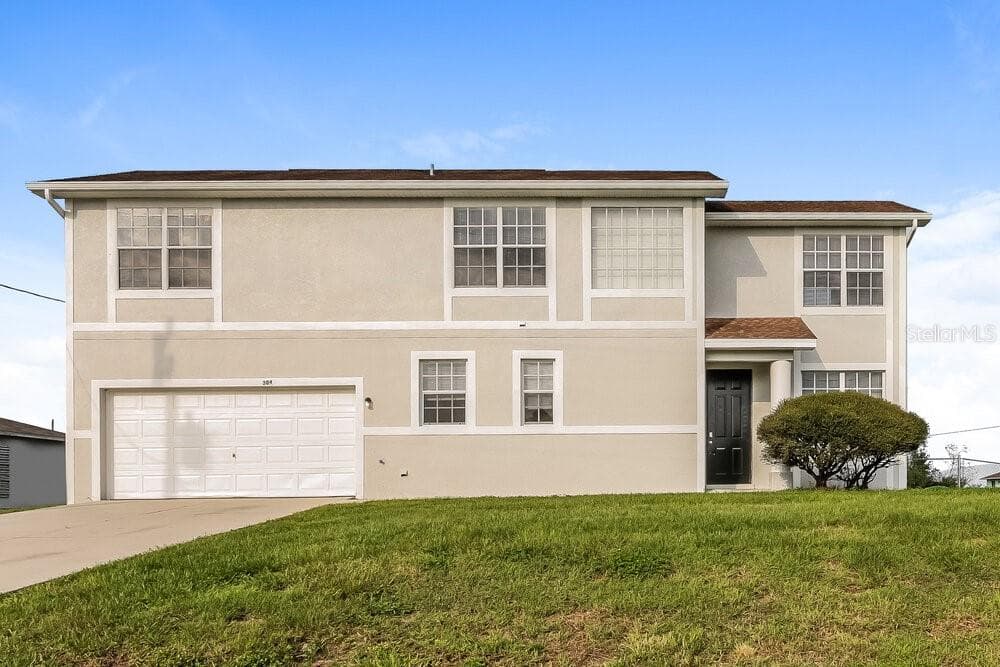 304 LANCELOT AVENUE LEHIGH ACRES, FL 33974