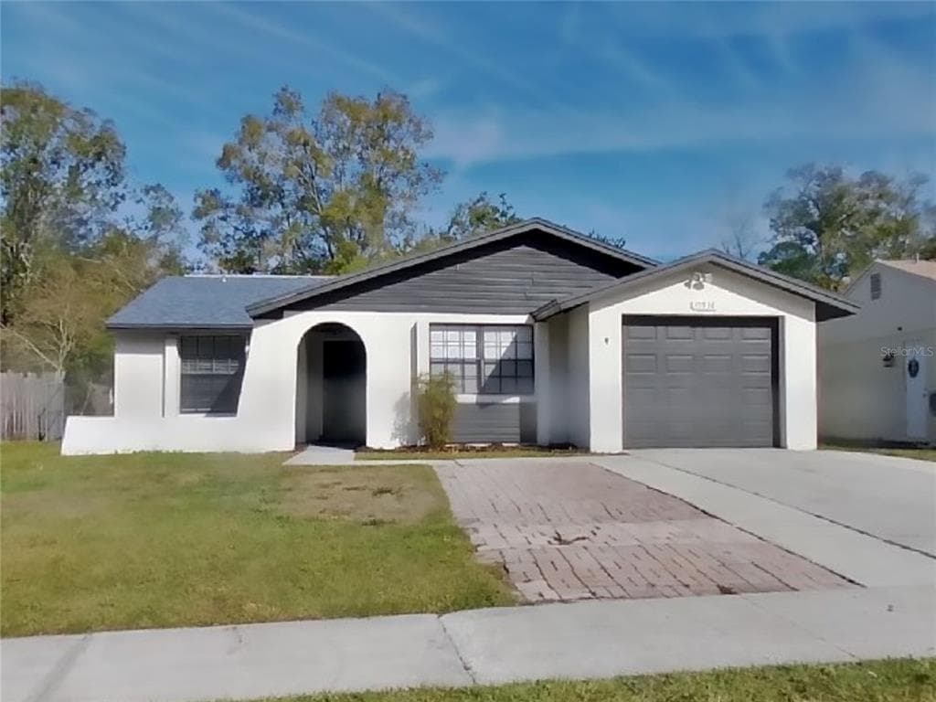 15936 WINDING DRIVE TAMPA, FL 33624