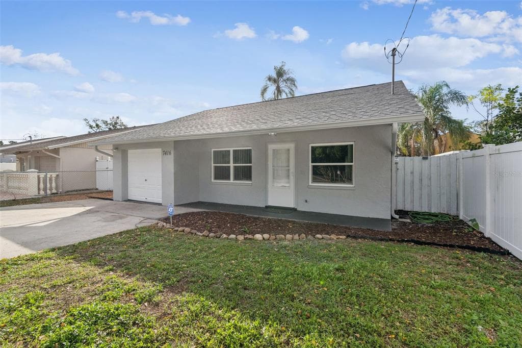 7416 MANHATTAN DRIVE TAMPA, FL 33625