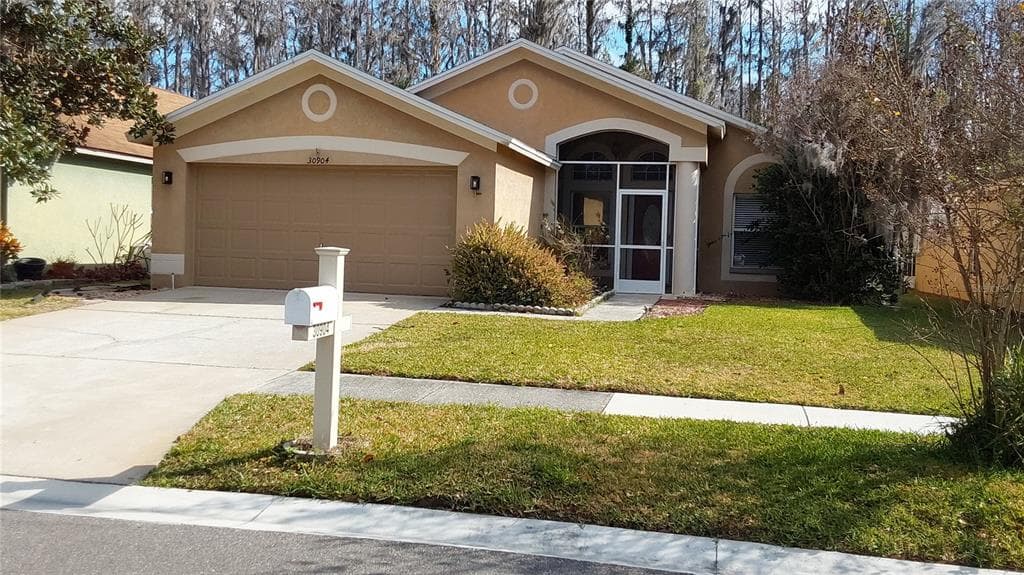 30904 BURLEIGH DRIVE WESLEY CHAPEL, FL 33543