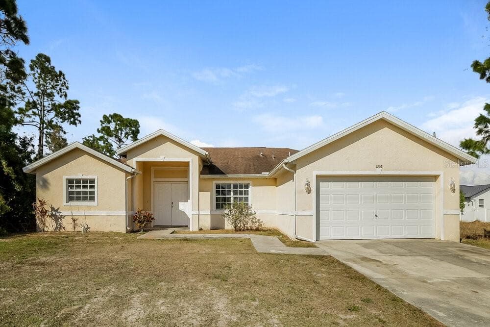 1207 SUMMA BOULEVARD LEHIGH ACRES, FL 33974