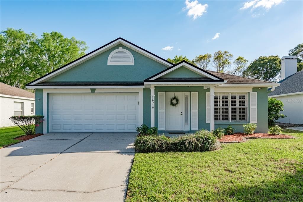 28540 TALL GRASS DRIVE WESLEY CHAPEL, FL 33543