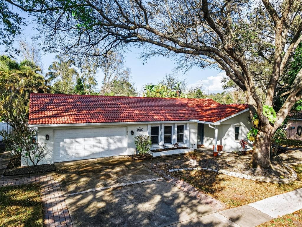 1889 MOURNING DOVE DRIVE PALM HARBOR, FL 34683