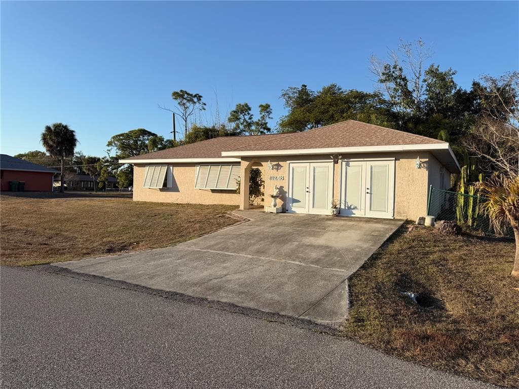 18248 REGAN AVENUE PORT CHARLOTTE, FL 33948