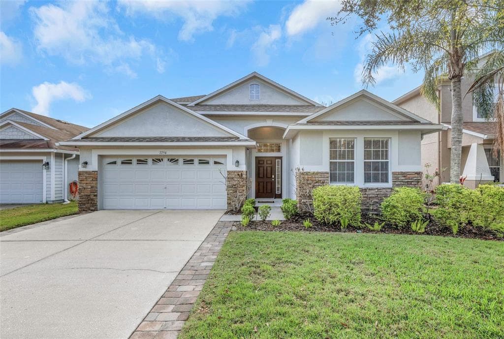 7754 STONELEIGH DRIVE LAND O LAKES, FL 34637