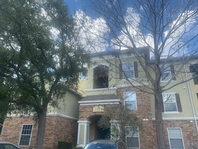 2402 COURTNEY MEADOWS COURT UNIT 303 TAMPA, FL 33619