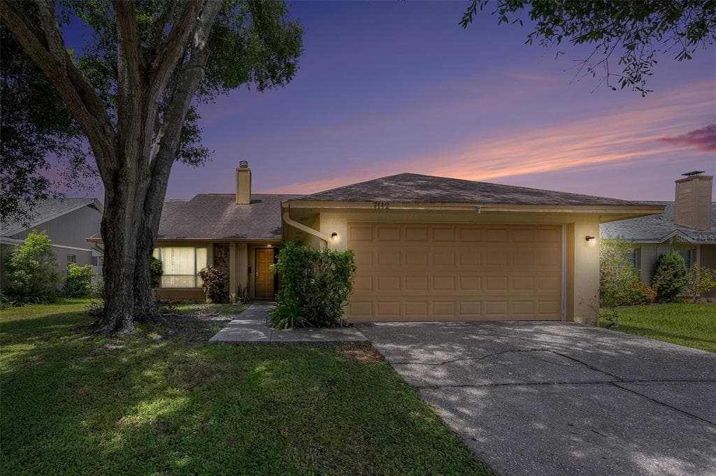 7112 HOLLOWELL DRIVE TAMPA, FL 33634