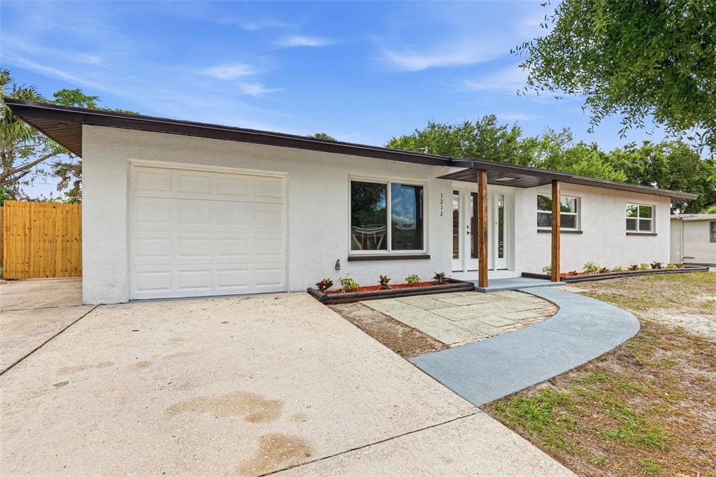 1212 JULIAN LANE DRIVE TAMPA, FL 33619
