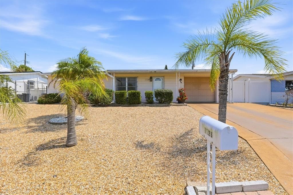 1126 CLAIRBORNE STREET HOLIDAY, FL 34690