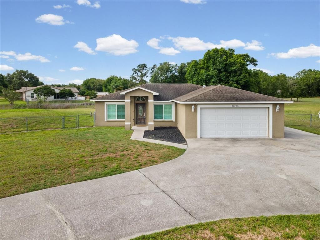 31706 HUNT CLUB LANE WESLEY CHAPEL, FL 33543