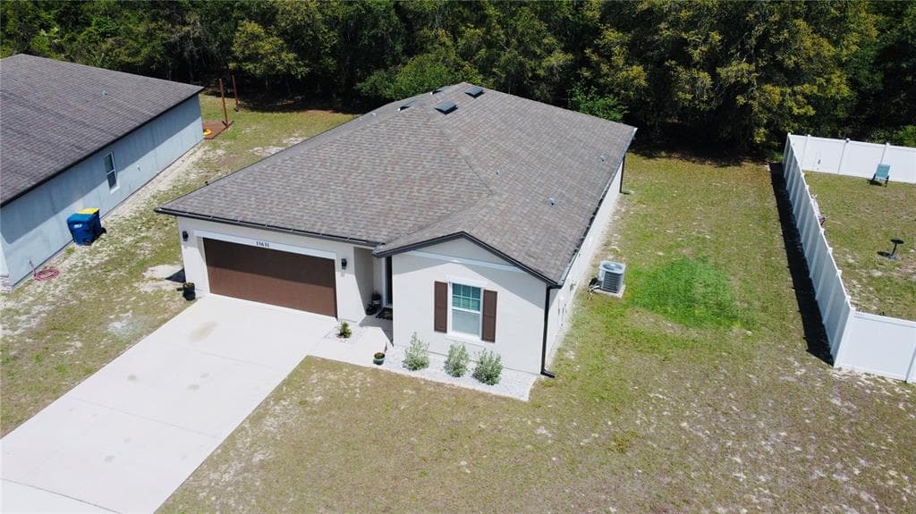 15631 MERLIN AVENUE MASCOTTE, FL 34753