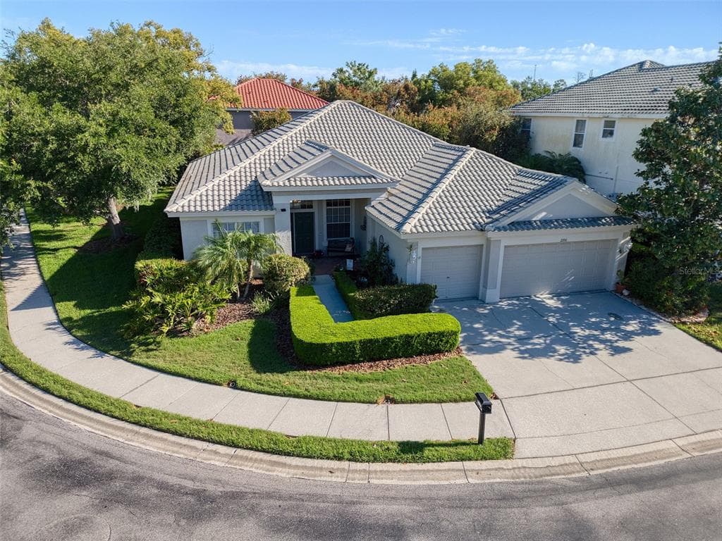 2206 HIGHLAND WOODS DRIVE DUNEDIN, FL 34698
