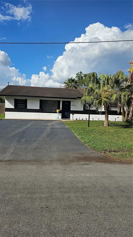 7714 DELEUIL AVENUE TAMPA, FL 33610