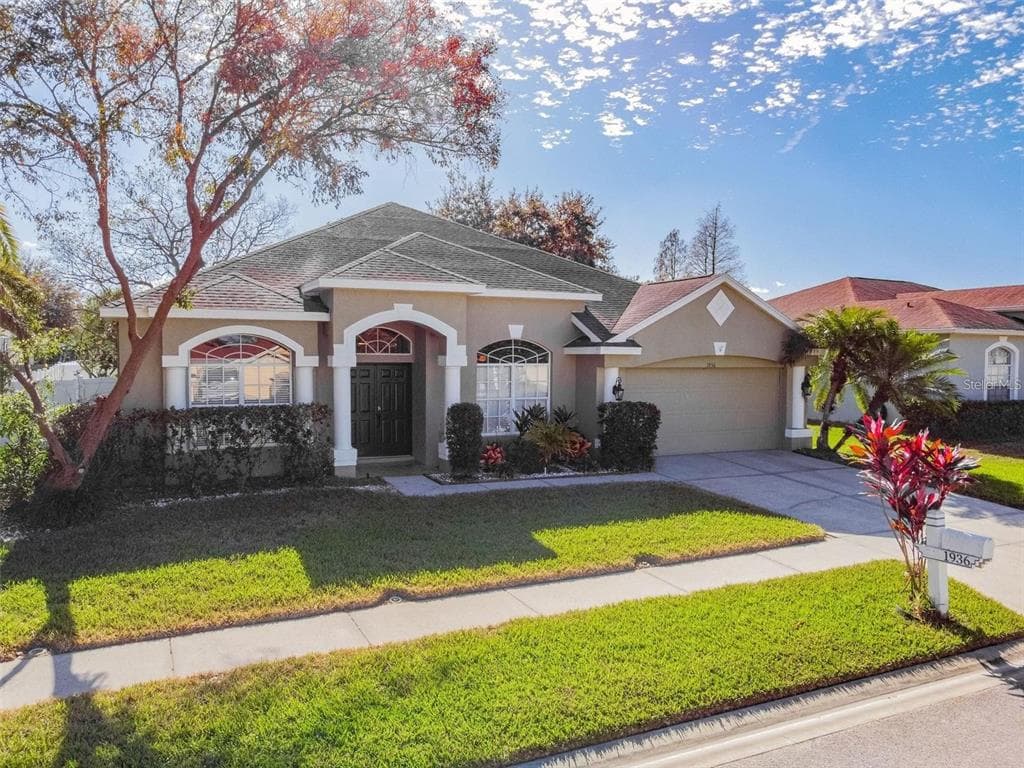 1936 TANGLEDVINE DRIVE WESLEY CHAPEL, FL 33543