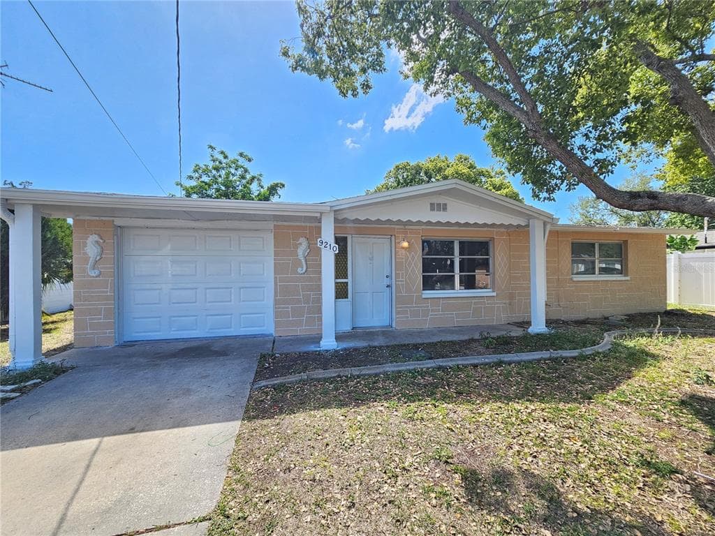 9210 PEGASUS AVENUE PORT RICHEY, FL 34668