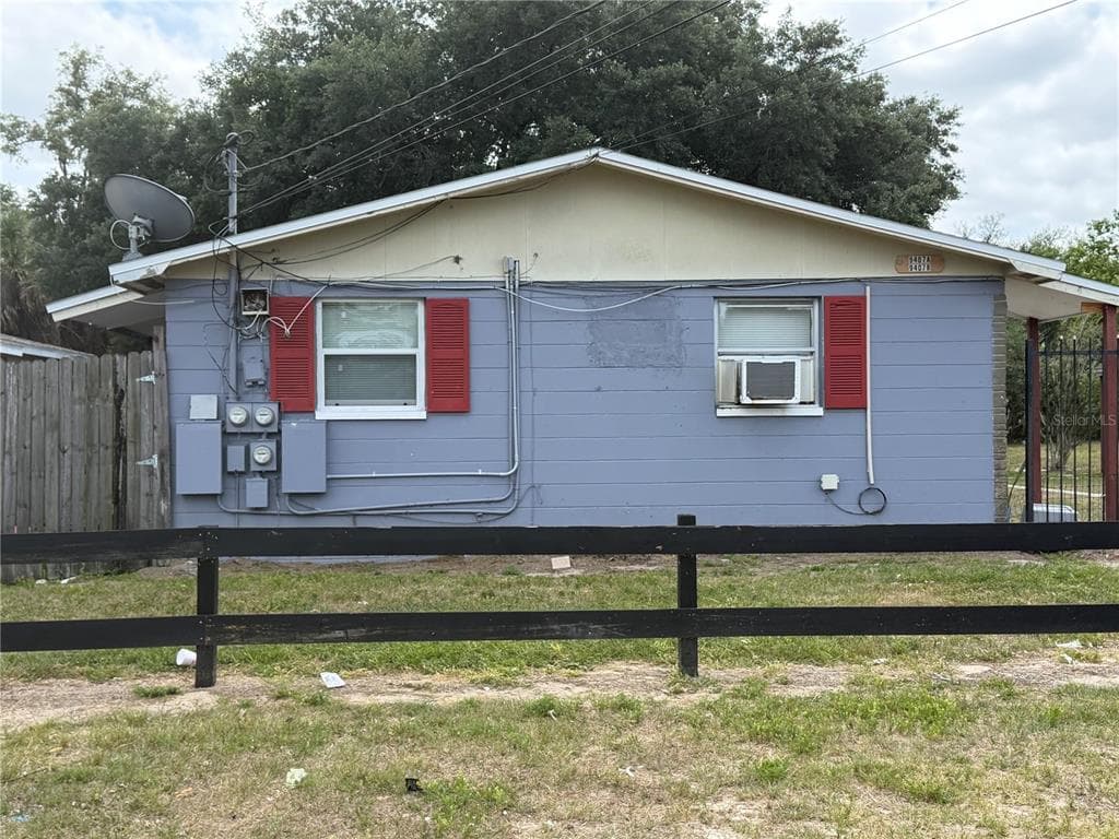 9407 GRANDFIELD ROAD THONOTOSASSA, FL 33592