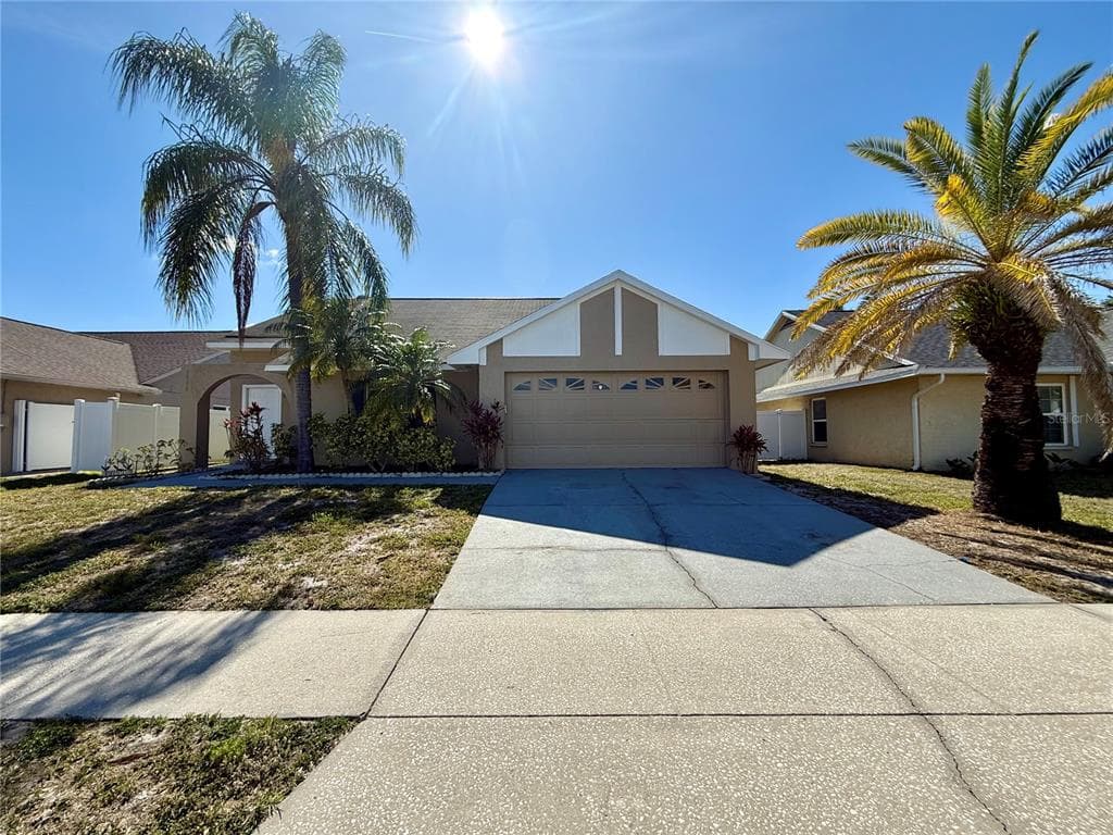 7048 HOLLOWELL DRIVE TAMPA, FL 33634