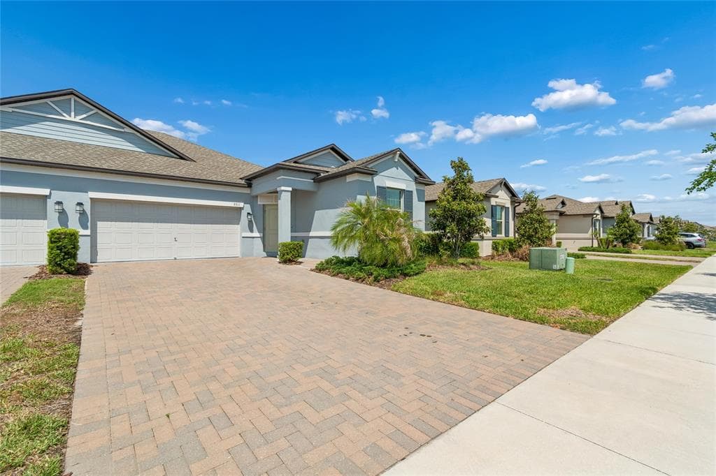 9911 CAMPANULA COURT LAND O LAKES, FL 34637