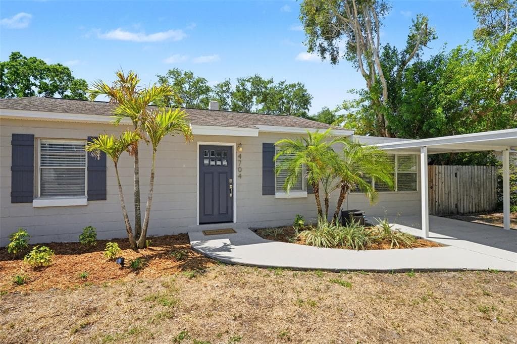 4704 W LAWN AVENUE TAMPA, FL 33611