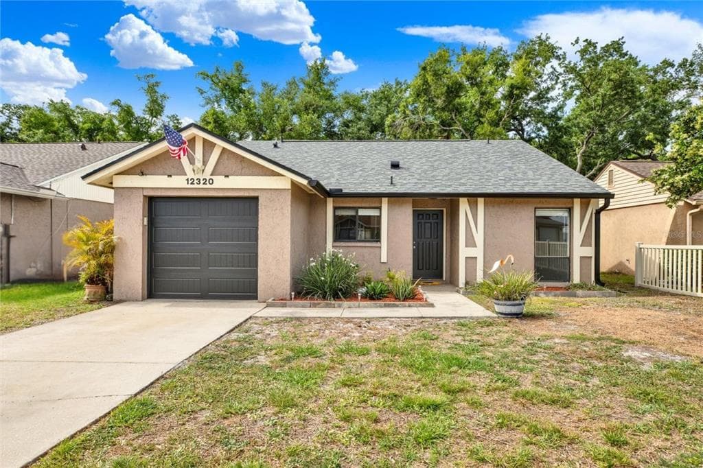 12320 WITHERIDGE DRIVE TAMPA, FL 33624
