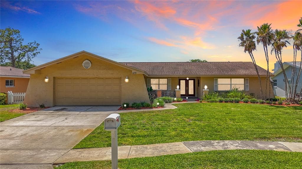 6490 BURNING TREE DRIVE