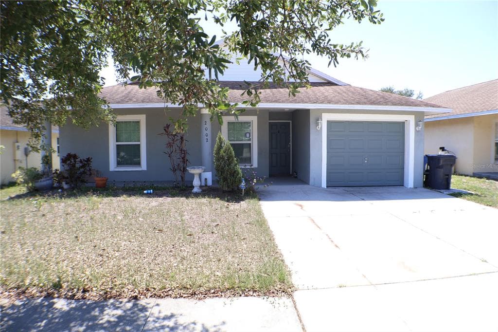 2002 PEACEFUL PALM STREET RUSKIN, FL 33570