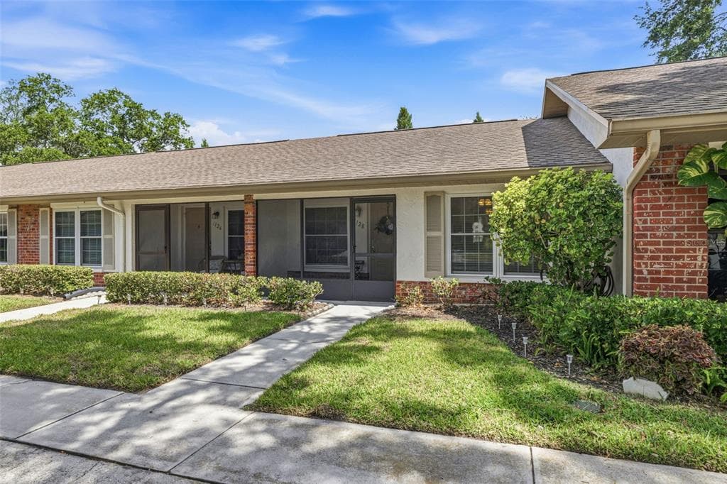 1128 TARRIDON COURT DUNEDIN, FL 34698