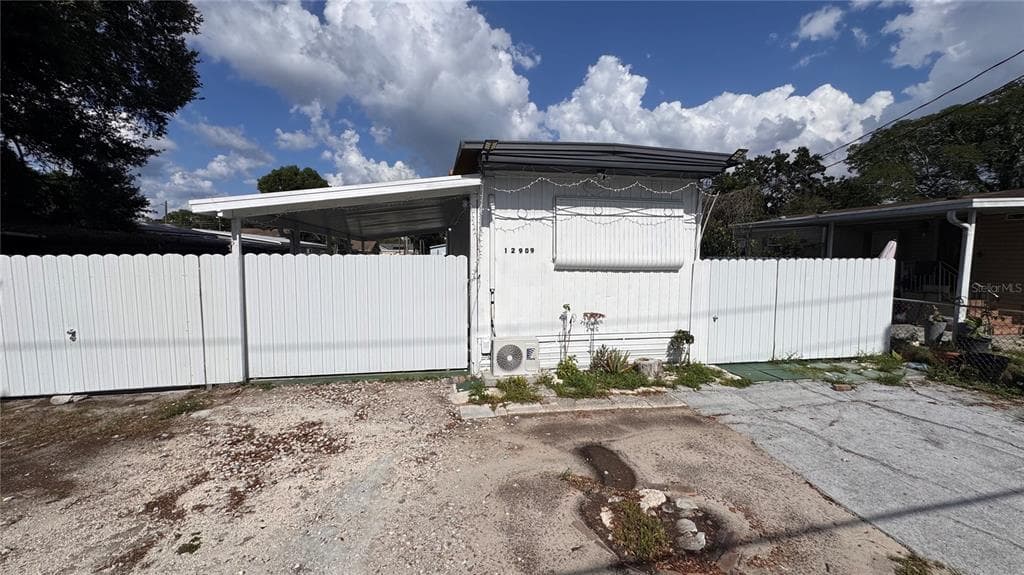 12909 FOUR OAKS ROAD TAMPA, FL 33624