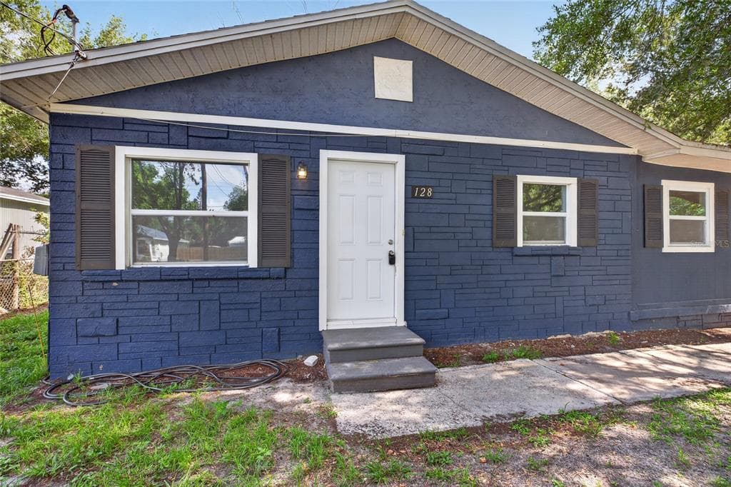 128 E 145TH AVENUE TAMPA, FL 33613