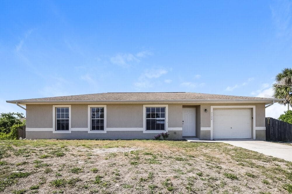 3102 39TH STREET SW LEHIGH ACRES, FL 33976